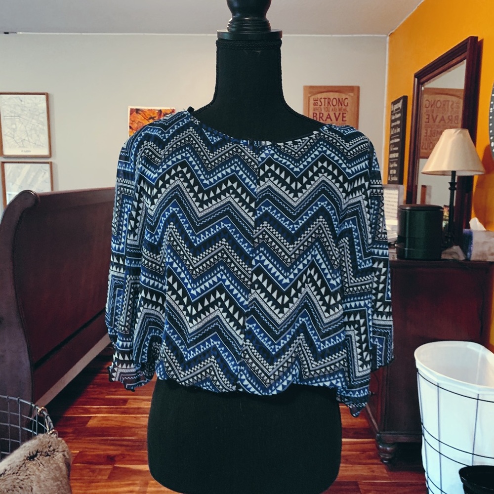 Blue white and black top